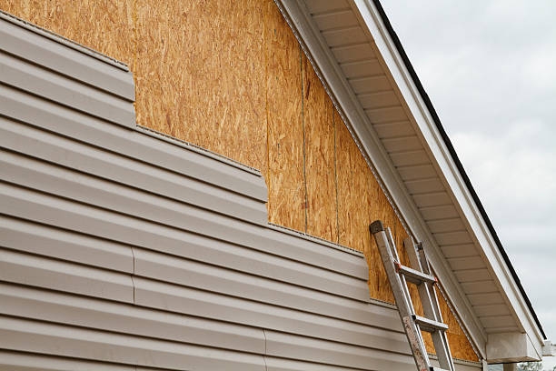 Professional Vinyl Siding technician working in Enola, PA